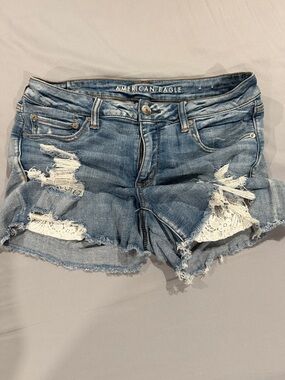 American Eagle Outfitters Blue Distressed Denim Shorts with White Lace Insets